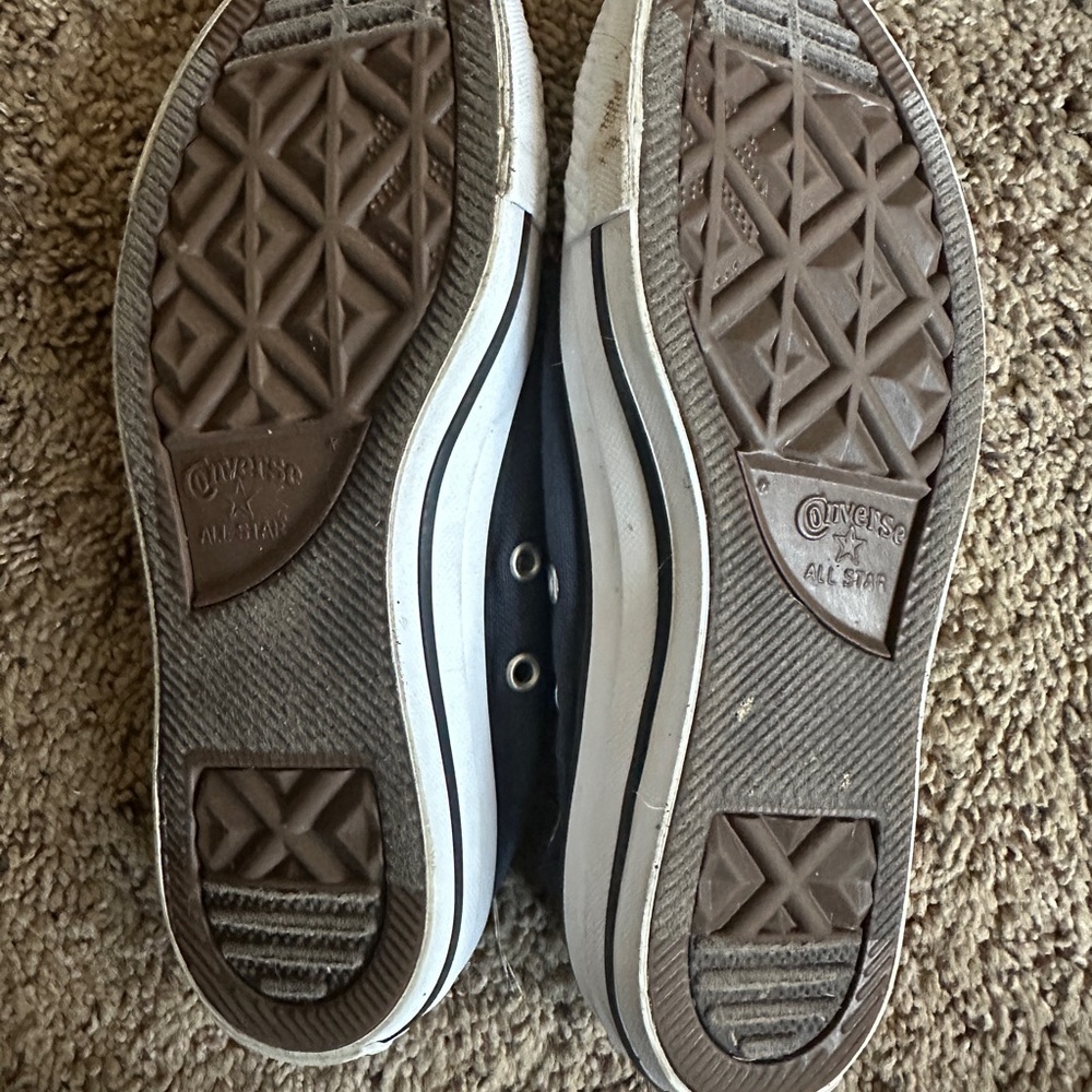 Converse White and Blue Sneakers with Distinctive Tread Pattern